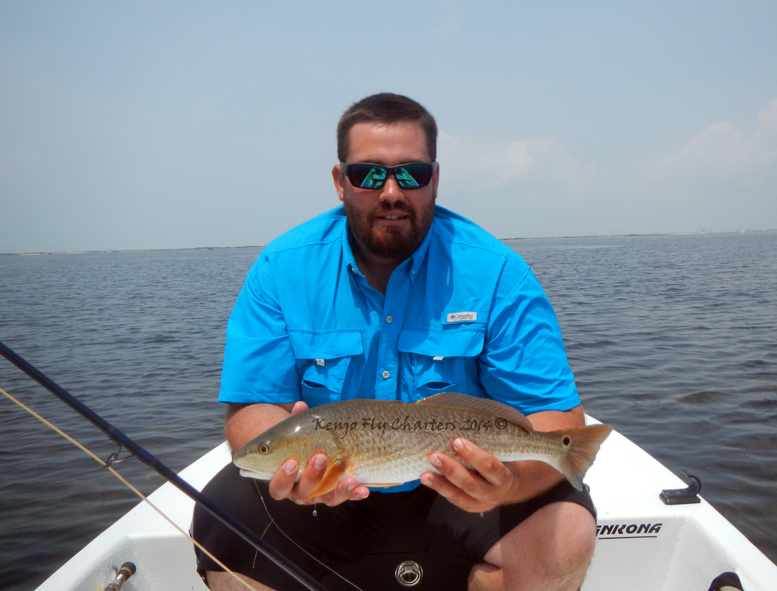Justinholdingfirstredfish Kenjo Fly Fishing Charters